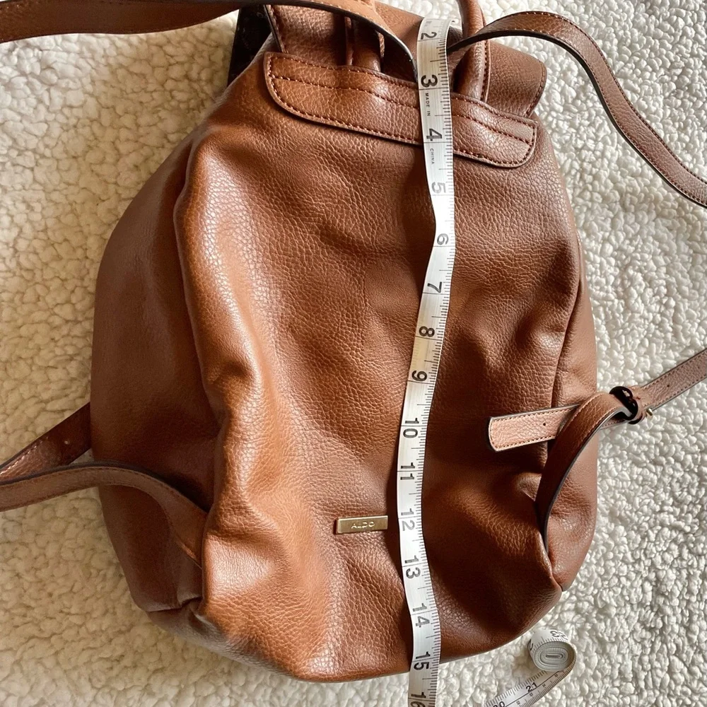 ALDO Drawstring Brown Backpack Adjustable Straps Snap Flap Closure - Picture 16 of 16